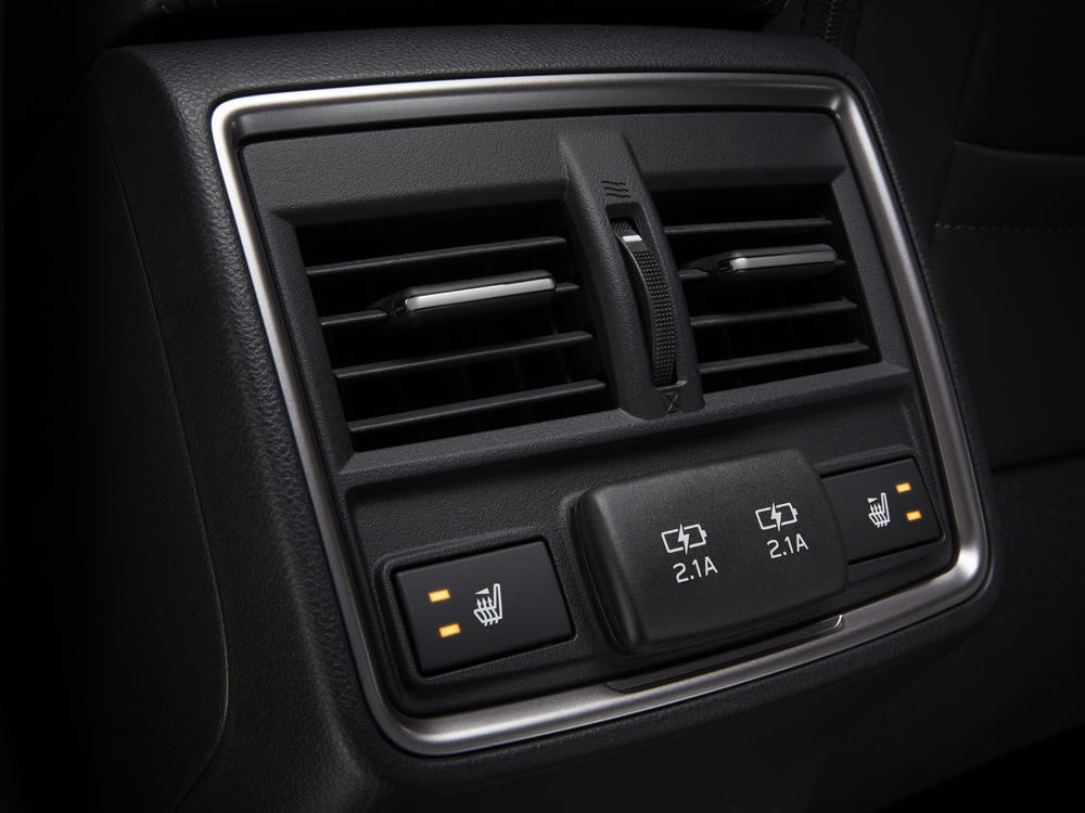 Close up shot of rear vents and USB ports for 2023 Forester Touring – Premier trims.