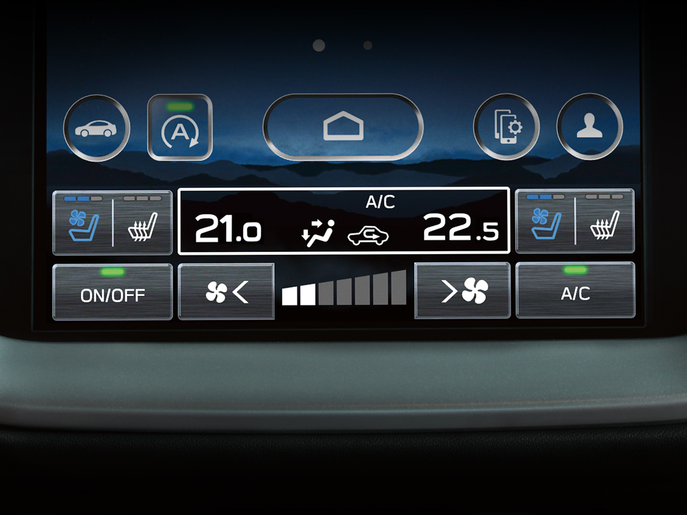 Plan rapproché des commandes de chauffage/climatisation sur l’écran principal de la Legacy GT.