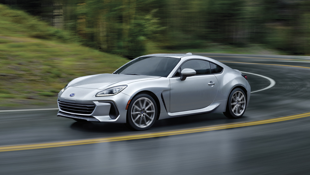 BRZ on a wet road showing the braking system helping to stop the vehicle.