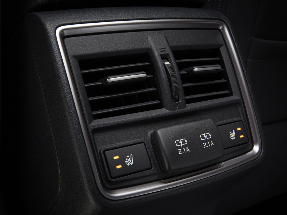 Close up shot of rear vents and USB ports for 2024 Forester Touring – Premier trims.
