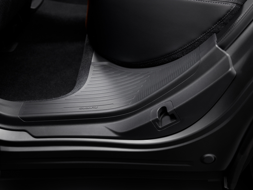 Close up shot of rear passenger door step with non-slip texture for 2024 Forester.