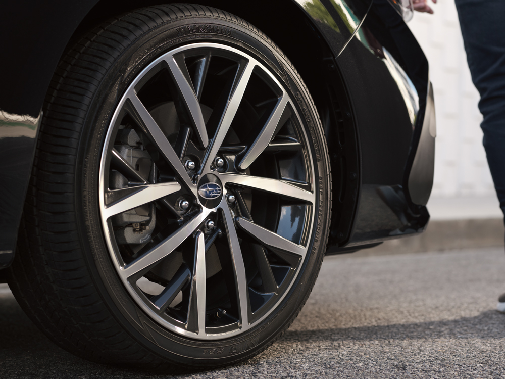 Close up of 18-inch aluminum alloy wheels with machined finish.