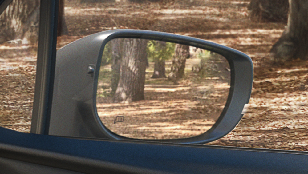 Vue du rétroviseur latéral d’une Forester 2025.
