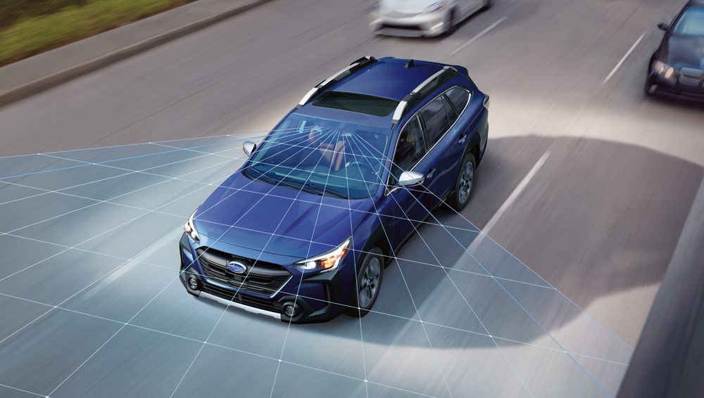 Outback 2025 avec système EyeSight® balayant la route devant.