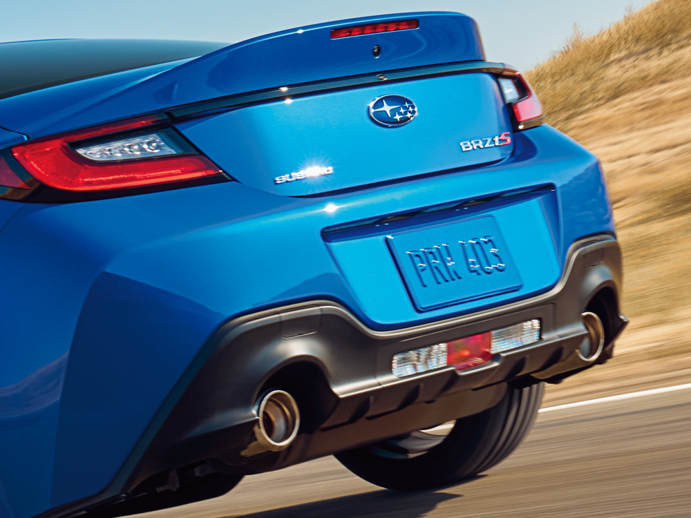 Close up of dual exhaust with stainless steel tips.