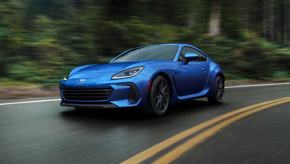 BRZ on a wet road showing the braking system helping to stop the vehicle.