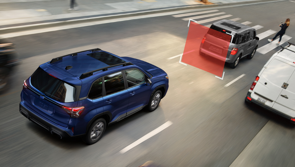 Forester 2026 sur une route humide et glissante.