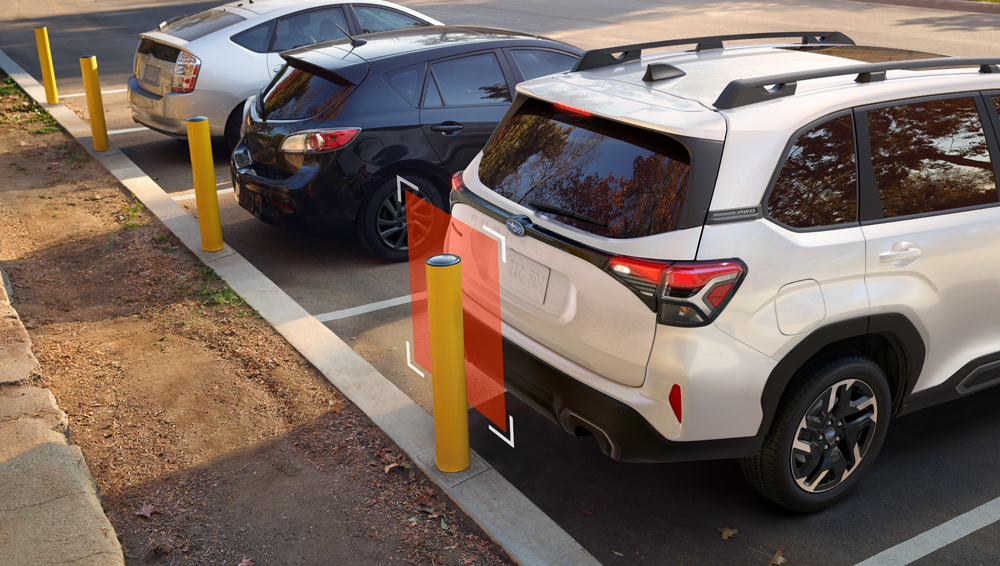 Illustration du fonctionnement du freinage automatique en marche arrière. 