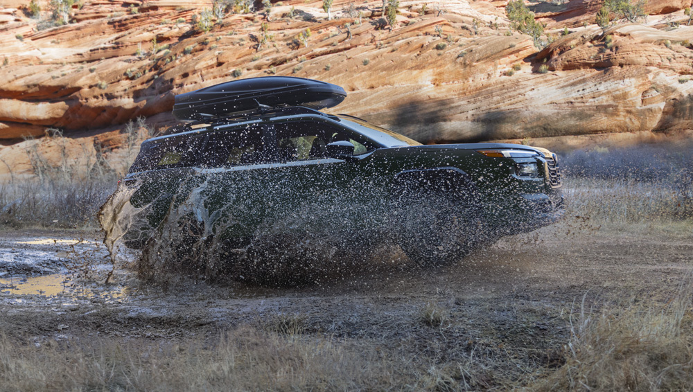 Image of Outback cornering in the rain.