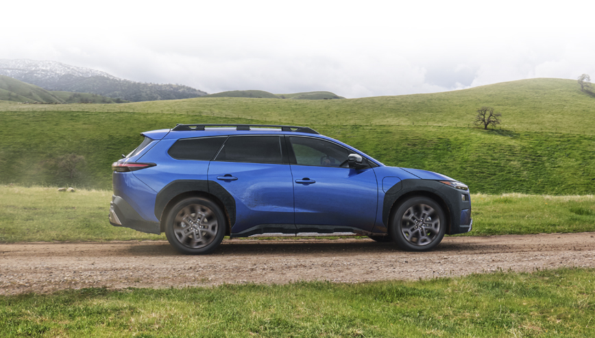 Rear shot of 2026 Trailseeker driving on dirt road.