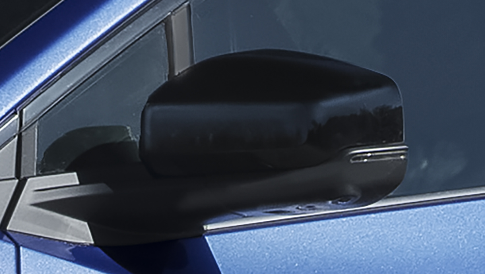 Close-up shot of 2026 Trailseeker heated, power adjustable side mirror.