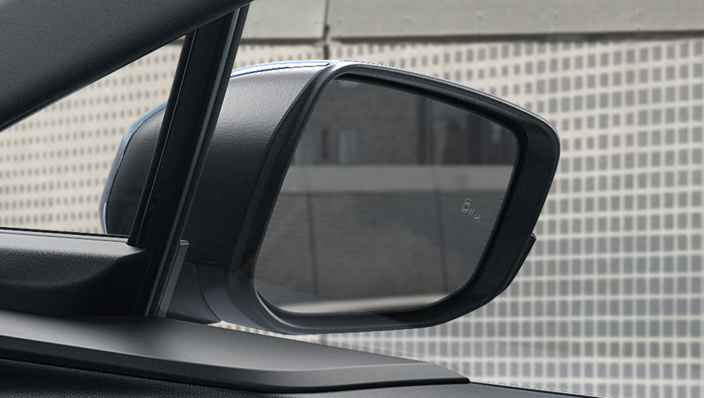 Close-up shot of 2026 Uncharted heated, power adjustable side mirror.