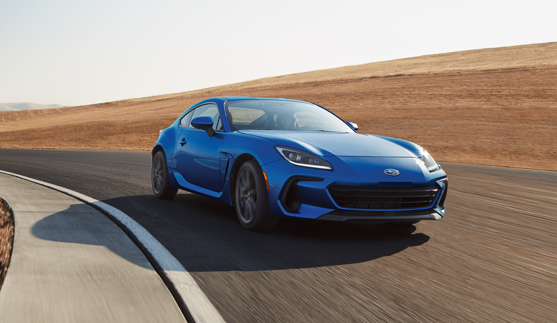 2024 BRZ driving fast on the race track.