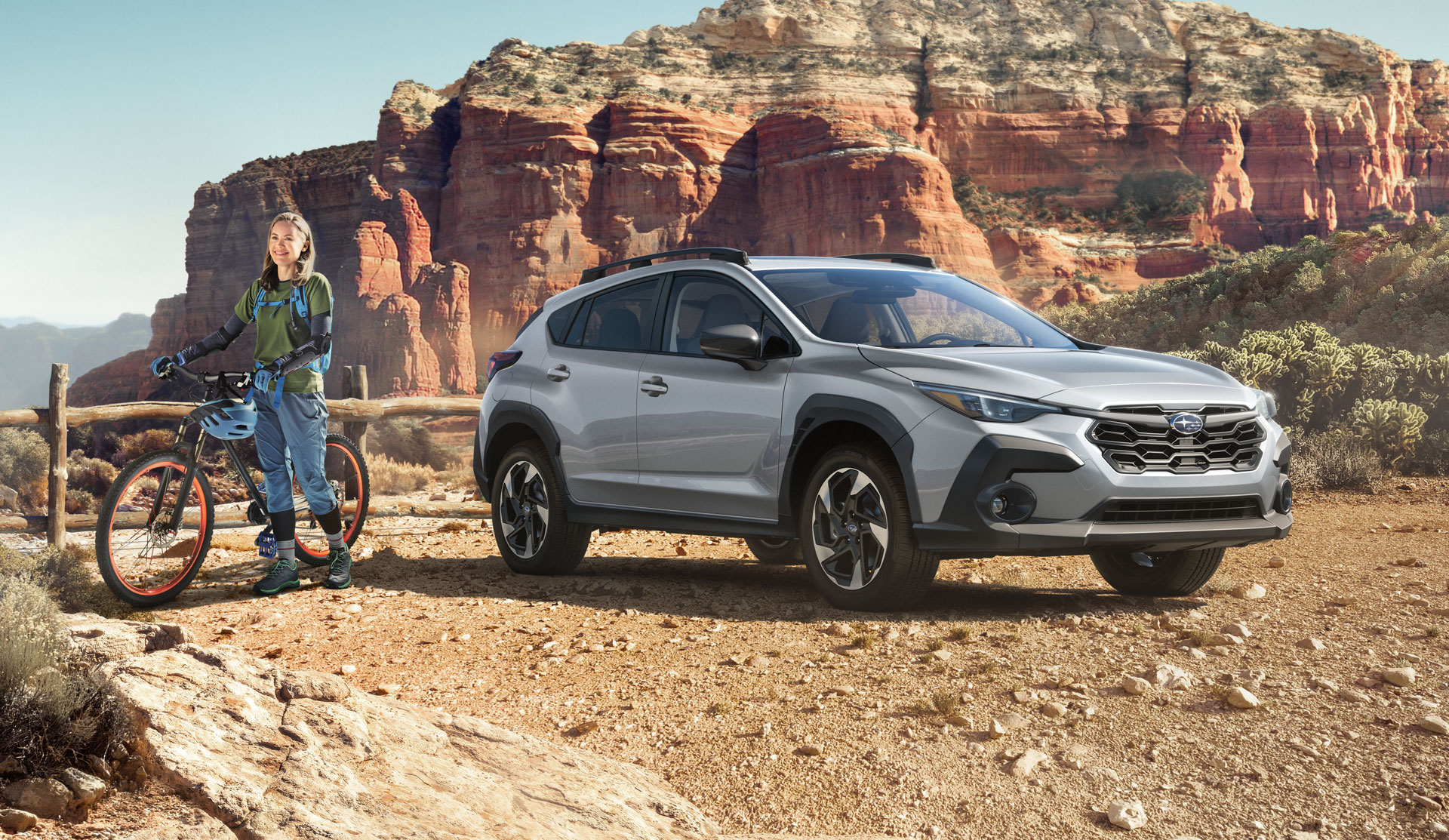 2024 Crosstrek driving along snowy mountain road.