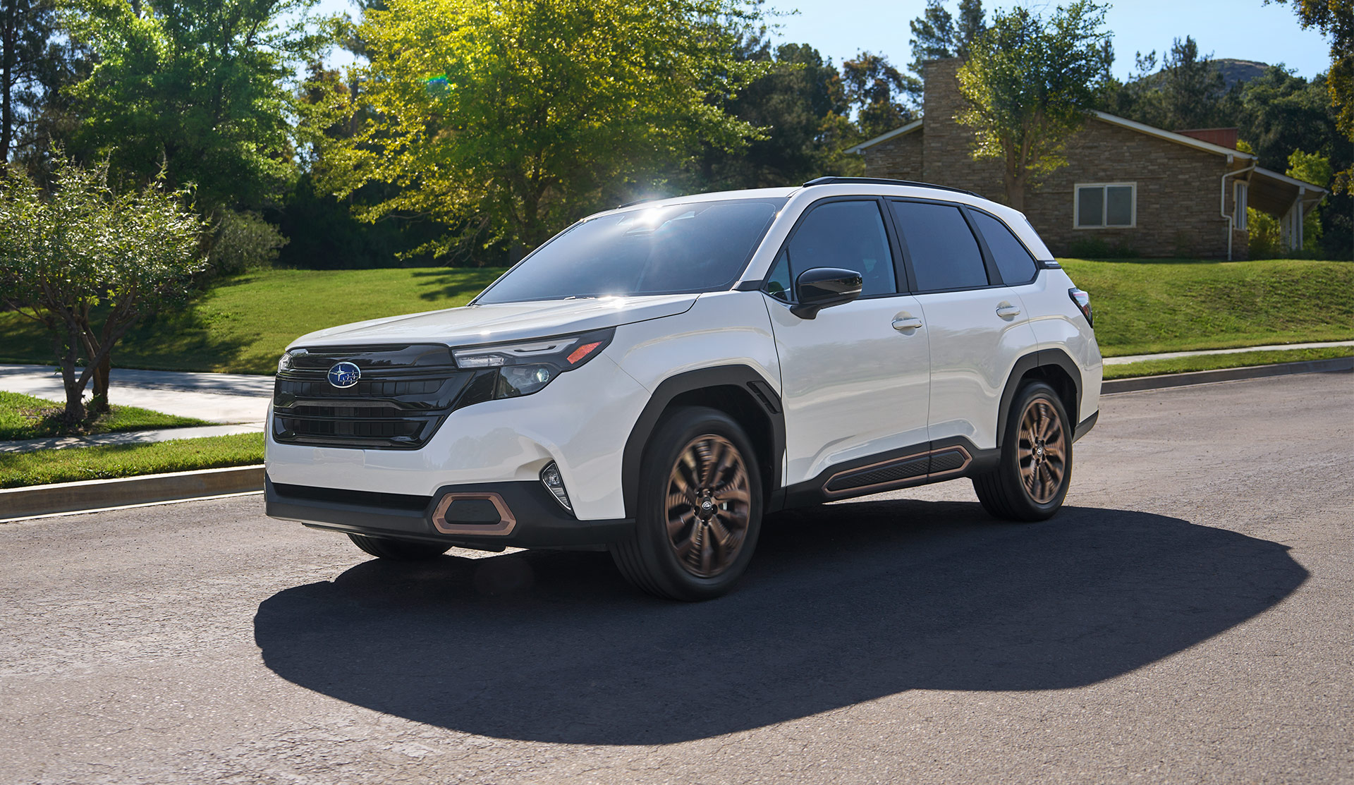 2025 Subaru Forester Sport in a suburban neighbourhood.