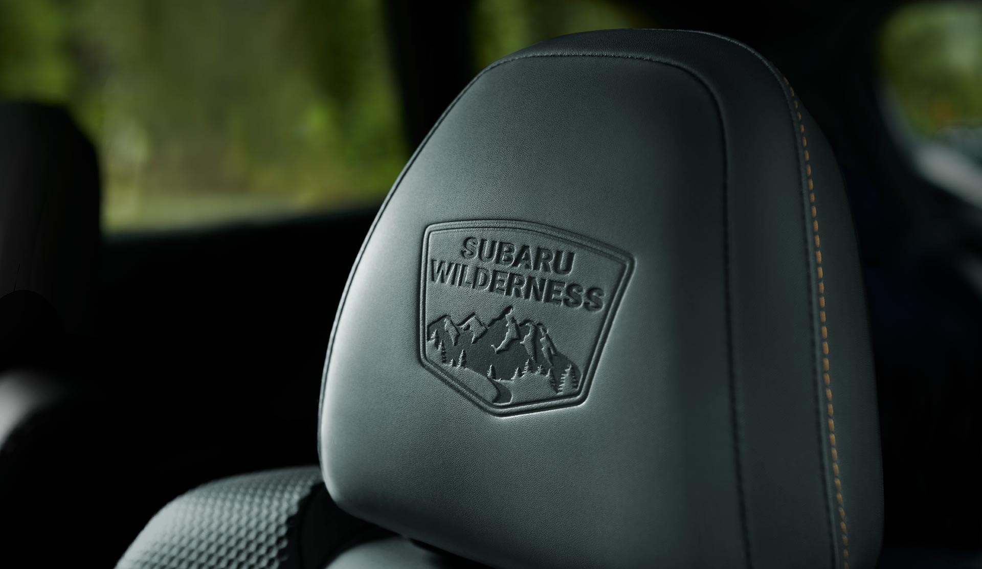 Close shot of Wilderness logo embossed headdress.