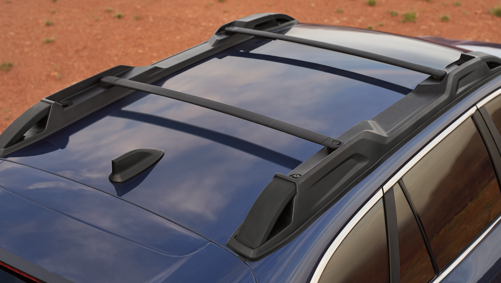 Closeup of 2024 Outback roof rails with swing-in-place crossbars.