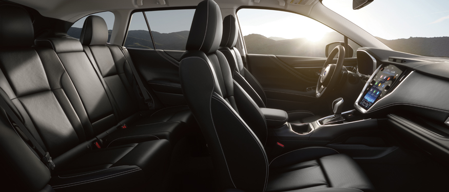 Close up side-shot of luxurious black leather seats of an Outback.