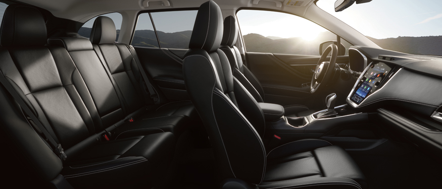Close up side-shot of luxurious black leather seats of an Outback.