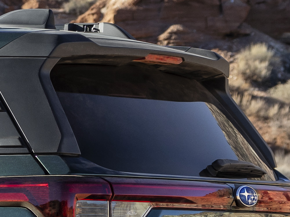Closeup of 2026 Outback roofline rear spoiler and integrated brake light.